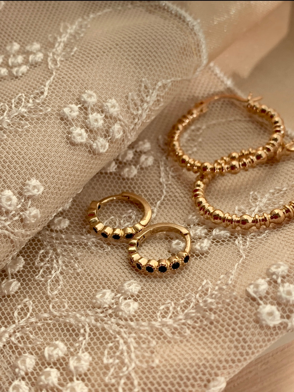 Black twinkling Hoops