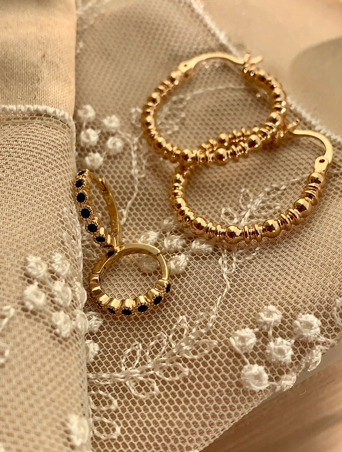 Black twinkling Hoops